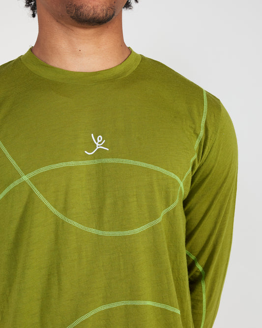 Green long-sleeve shirt with a logo on a plain background